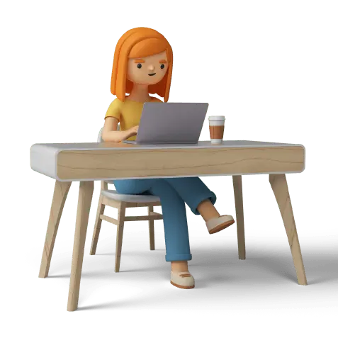 Paní u stolu s notebookem při tvorbě webu